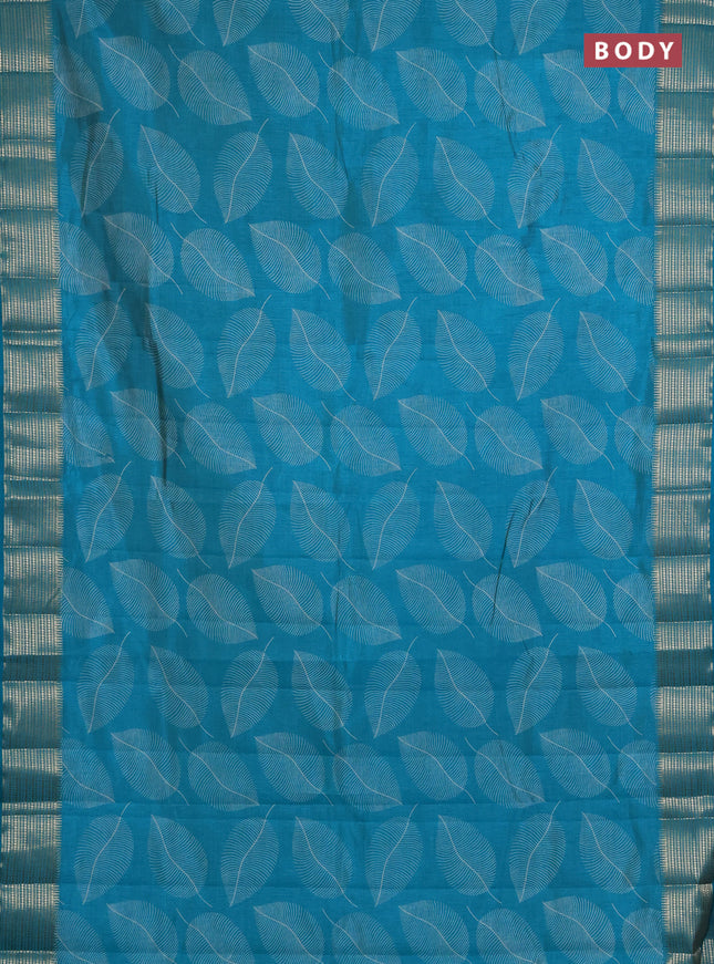 Semi raw silk saree teal blue with allover butta prints and temple design zari woven border