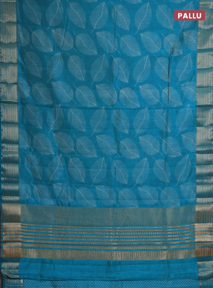 Semi raw silk saree teal blue with allover butta prints and temple design zari woven border
