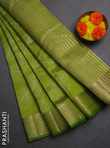 Semi raw silk saree light green with allover butta prints and temple design zari woven border