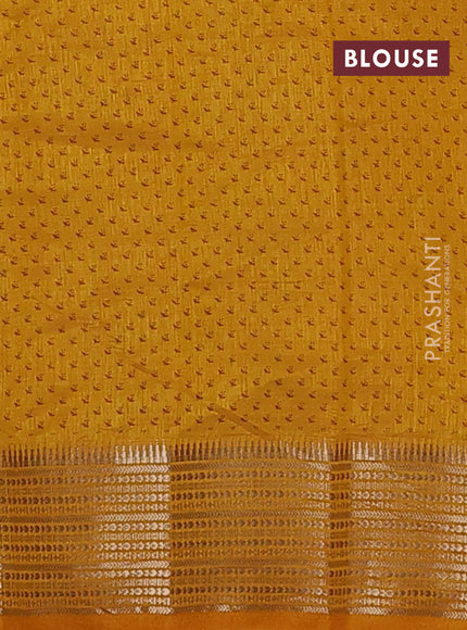 Semi raw silk saree mustard yellow with allover butta prints and temple design zari woven border