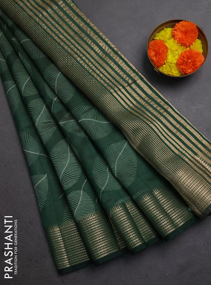 Semi raw silk saree bottle green with allover butta prints and temple design zari woven border