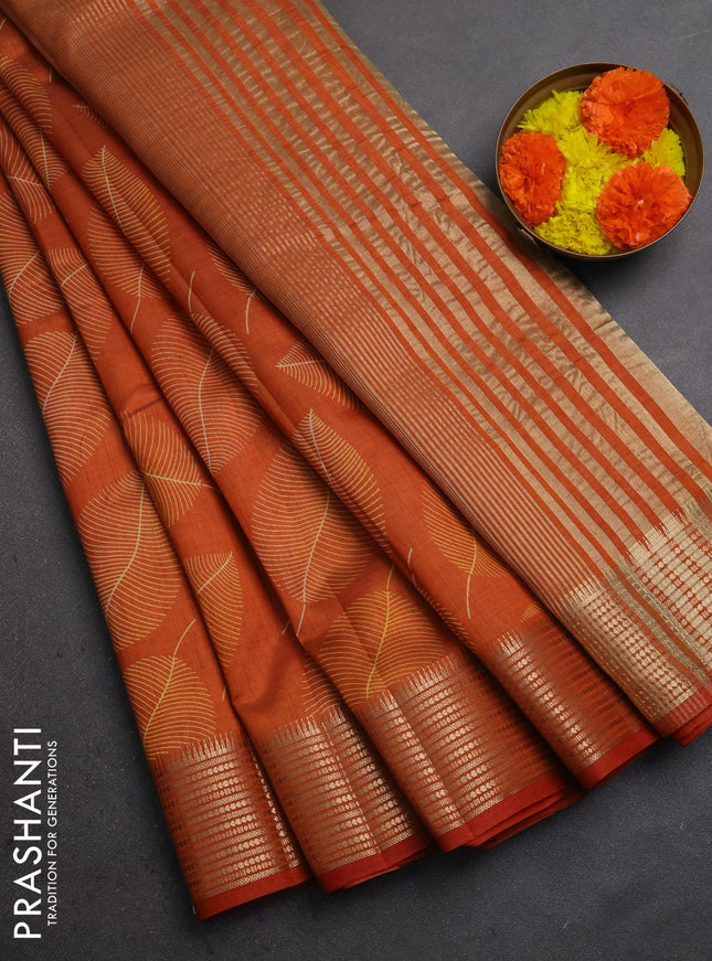 Semi raw silk saree rustic orange with allover butta prints and temple design zari woven border