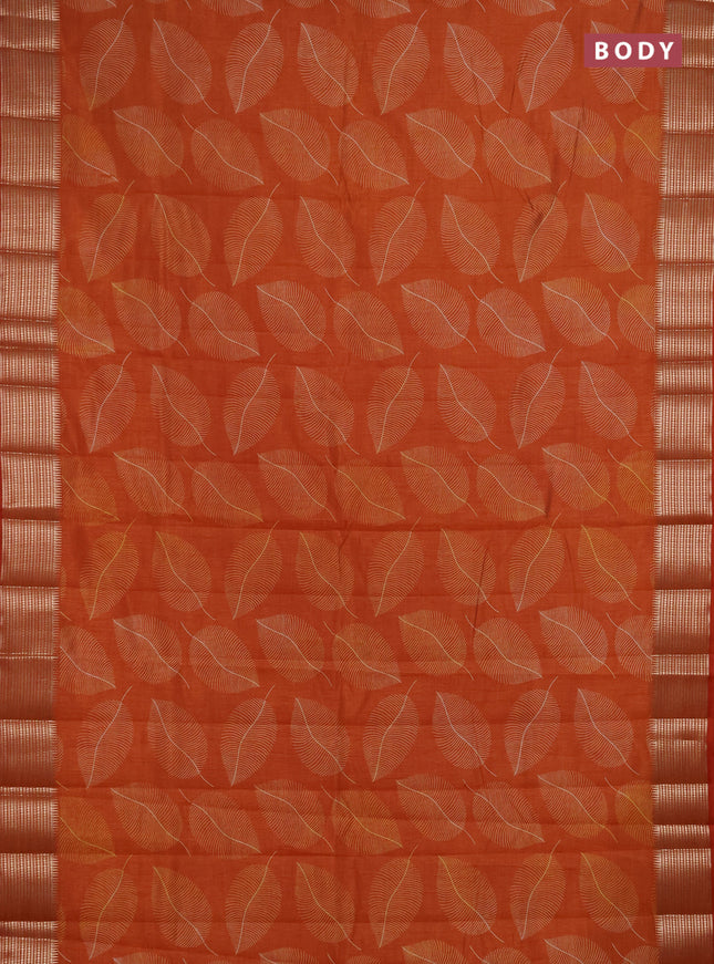 Semi raw silk saree rustic orange with allover butta prints and temple design zari woven border