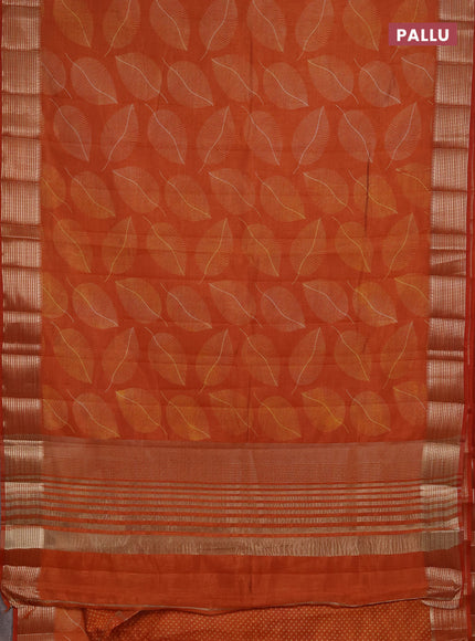 Semi raw silk saree rustic orange with allover butta prints and temple design zari woven border