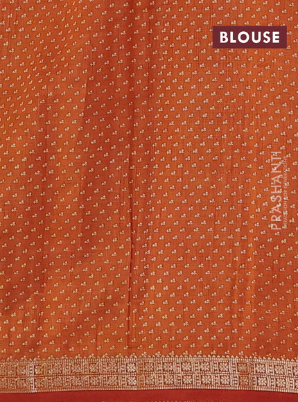 Semi raw silk saree rustic orange with allover floral butta prints and zari woven border