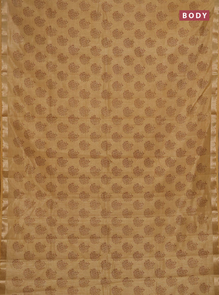 Semi raw silk saree sandal with allover floral butta prints and zari woven border