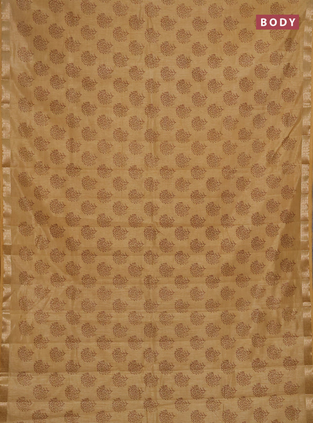 Semi raw silk saree sandal with allover floral butta prints and zari woven border