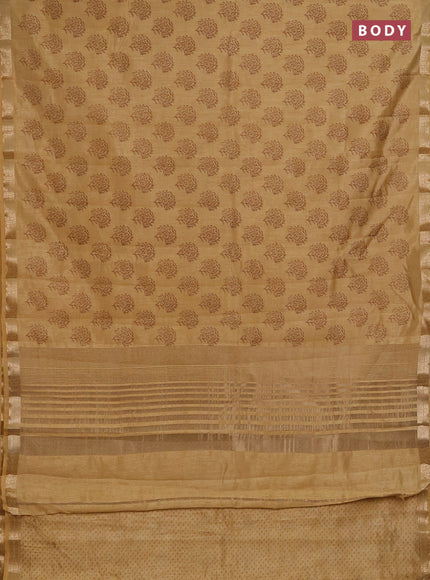 Semi raw silk saree sandal with allover floral butta prints and zari woven border