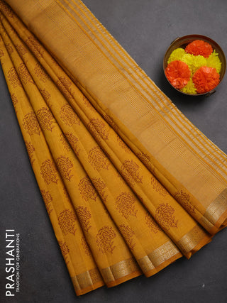 Semi raw silk saree dark mustard with allover floral butta prints and zari woven border