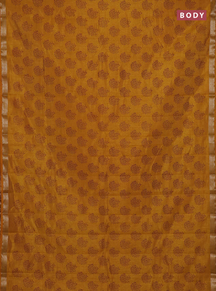 Semi raw silk saree dark mustard with allover floral butta prints and zari woven border