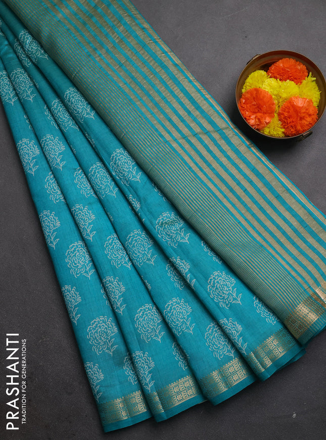 Semi raw silk saree teal green with allover floral butta prints and zari woven border