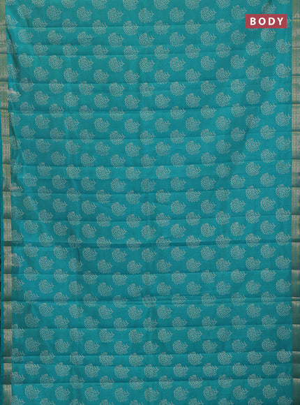 Semi raw silk saree teal green with allover floral butta prints and zari woven border