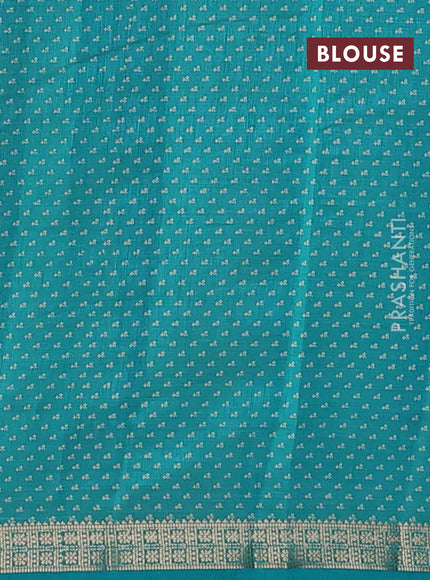 Semi raw silk saree teal green with allover floral butta prints and zari woven border