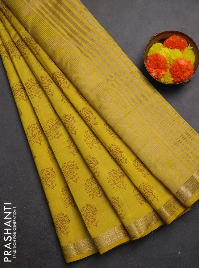 Semi raw silk saree mustard yellow with allover floral butta prints and zari woven border