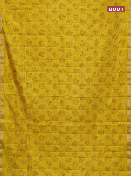 Semi raw silk saree mustard yellow with allover floral butta prints and zari woven border