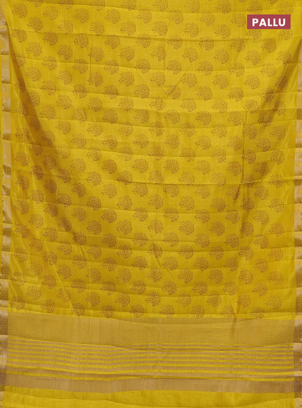 Semi raw silk saree mustard yellow with allover floral butta prints and zari woven border