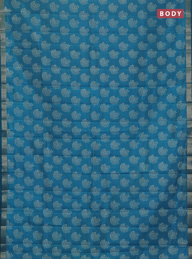 Semi raw silk saree teal blue with allover floral butta prints and zari woven border
