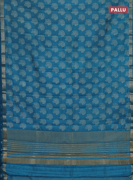 Semi raw silk saree teal blue with allover floral butta prints and zari woven border