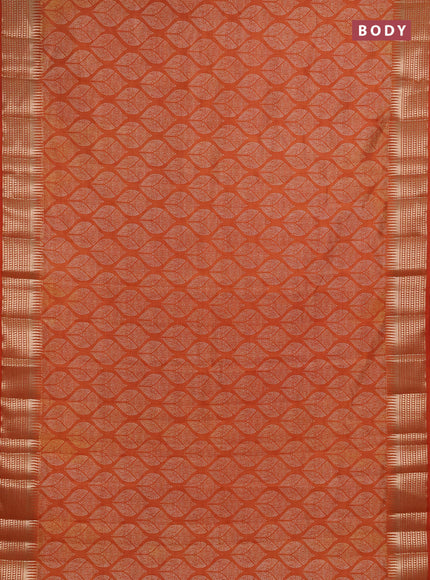 Semi raw silk saree rustic orange with allover geometric butta prints and temple design zari woven border