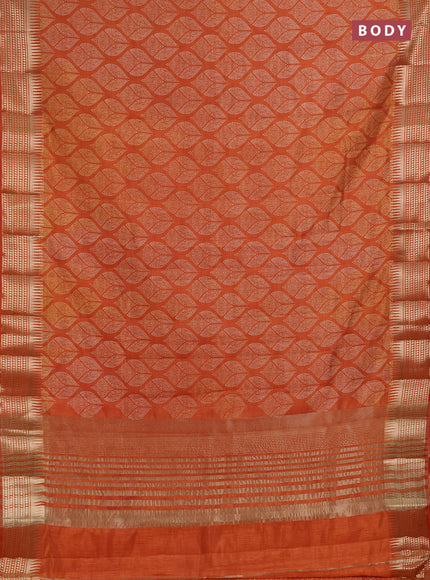 Semi raw silk saree rustic orange with allover geometric butta prints and temple design zari woven border