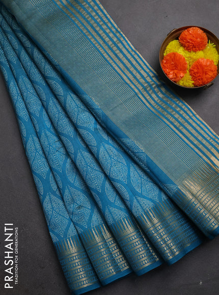 Semi raw silk saree teal blue with allover geometric butta prints and temple design zari woven border