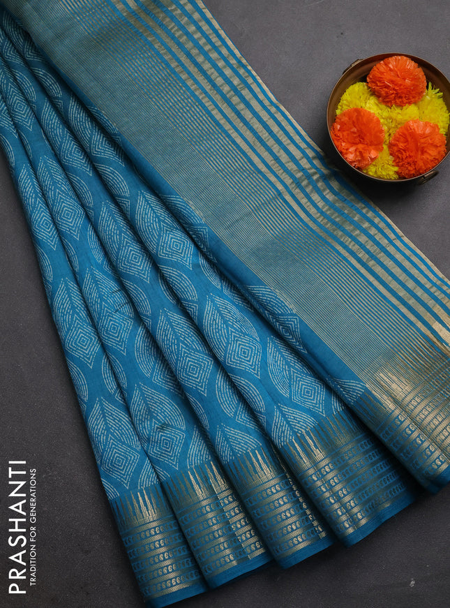 Semi raw silk saree teal blue with allover geometric butta prints and temple design zari woven border