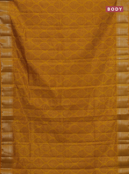 Semi raw silk saree dark mustard shade with allover geometric butta prints and temple design zari woven border