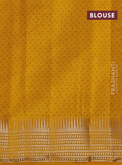 Semi raw silk saree dark mustard shade with allover geometric butta prints and temple design zari woven border
