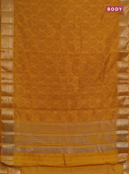 Semi raw silk saree dark mustard with allover geometric butta prints and temple design zari woven border