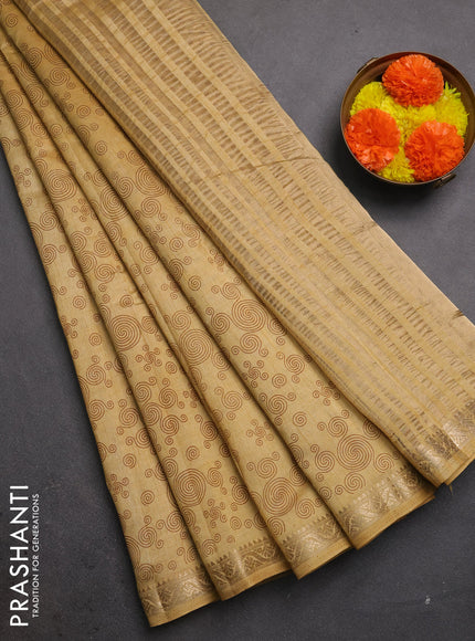 Semi raw silk saree sandal with allover geometric prints and zari woven border