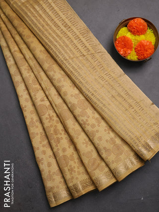Semi raw silk saree sandal with allover geometric prints and zari woven border
