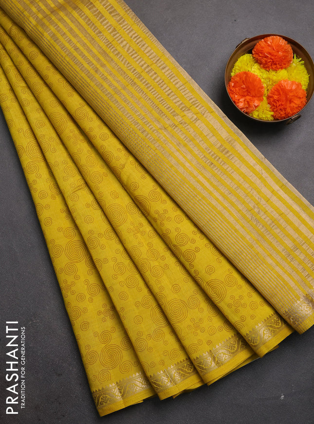 Semi raw silk saree mustard yellow with allover geometric prints and zari woven border