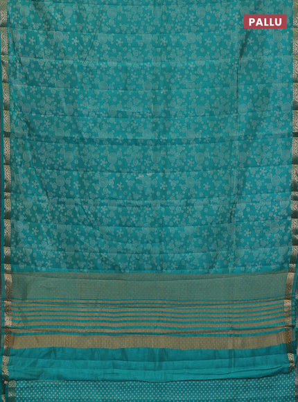 Semi raw silk saree teal green with allover geometric prints and zari woven border