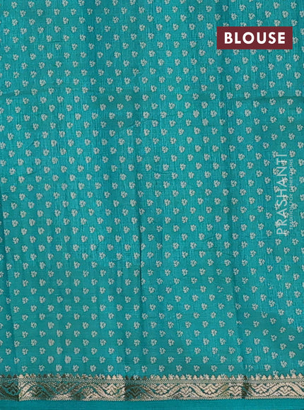 Semi raw silk saree teal green with allover geometric prints and zari woven border
