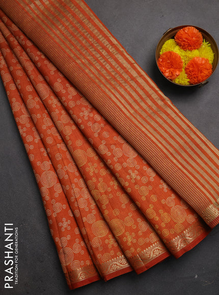 Semi raw silk saree rustic orange with allover geometric prints and zari woven border