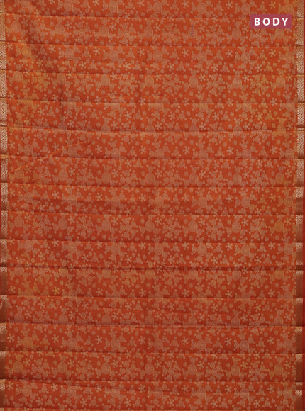 Semi raw silk saree rustic orange with allover geometric prints and zari woven border