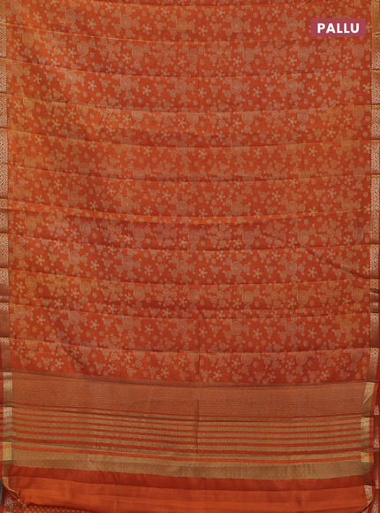 Semi raw silk saree rustic orange with allover geometric prints and zari woven border