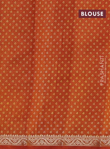 Semi raw silk saree rustic orange with allover geometric prints and zari woven border