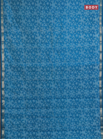 Semi raw silk saree teal blue with allover geometric prints and zari woven border