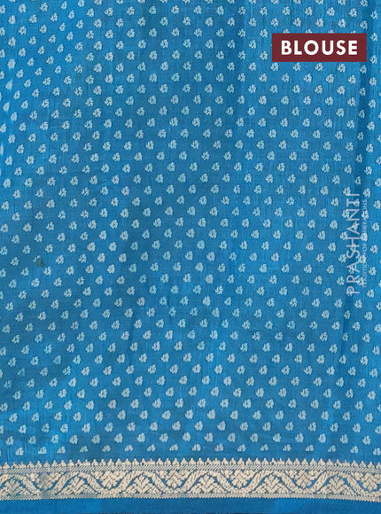 Semi raw silk saree teal blue with allover geometric prints and zari woven border
