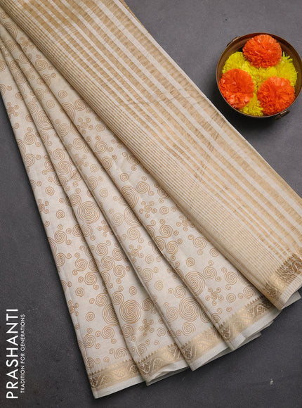 Semi raw silk saree cream with allover geometric prints and zari woven border