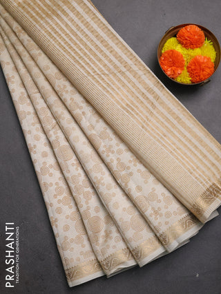 Semi raw silk saree cream with allover geometric prints and zari woven border