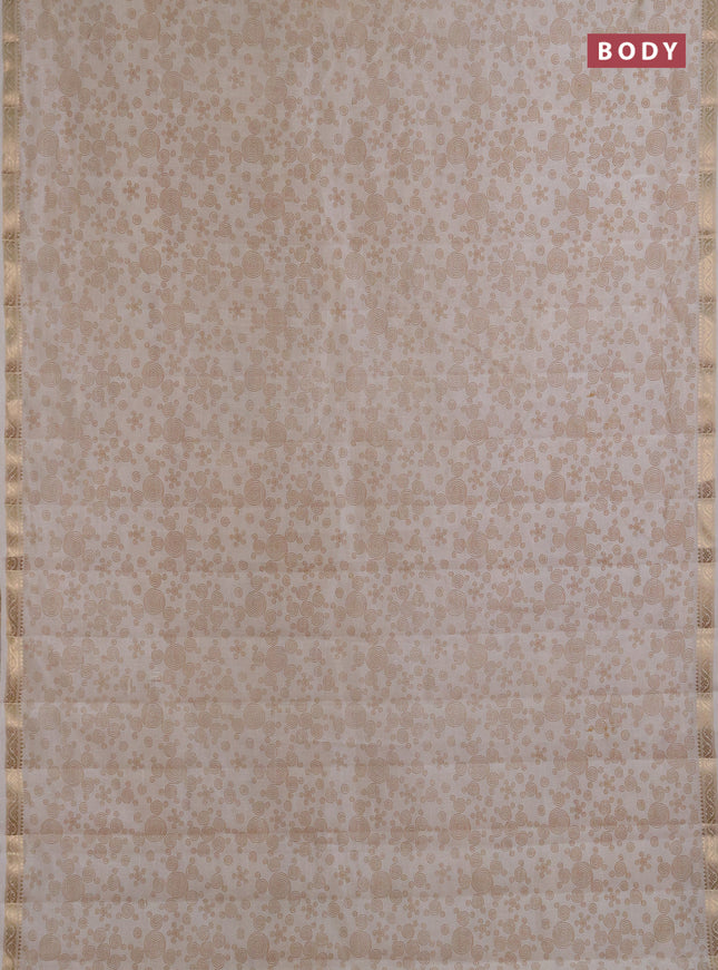 Semi raw silk saree cream with allover geometric prints and zari woven border