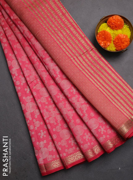 Semi raw silk saree pink shade with allover geometric prints and zari woven border