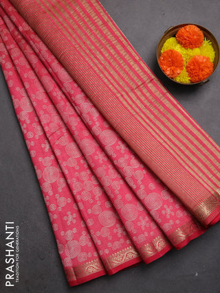 Semi raw silk saree pink shade with allover geometric prints and zari woven border
