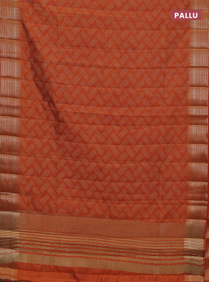 Semi raw silk saree rustic orange with allover geometric butta prints and temple design zari woven border