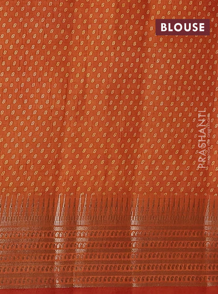 Semi raw silk saree rustic orange with allover geometric butta prints and temple design zari woven border