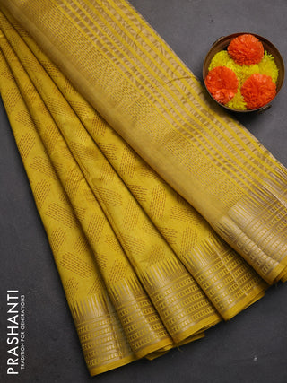 Semi raw silk saree mustard yellow with allover geometric butta prints and temple design zari woven border