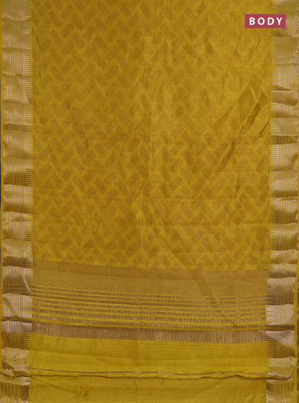 Semi raw silk saree mustard yellow with allover geometric butta prints and temple design zari woven border