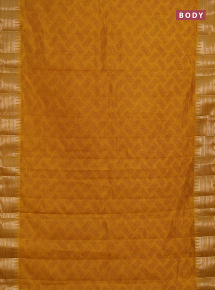 Semi raw silk saree dark mustard with allover geometric butta prints and temple design zari woven border